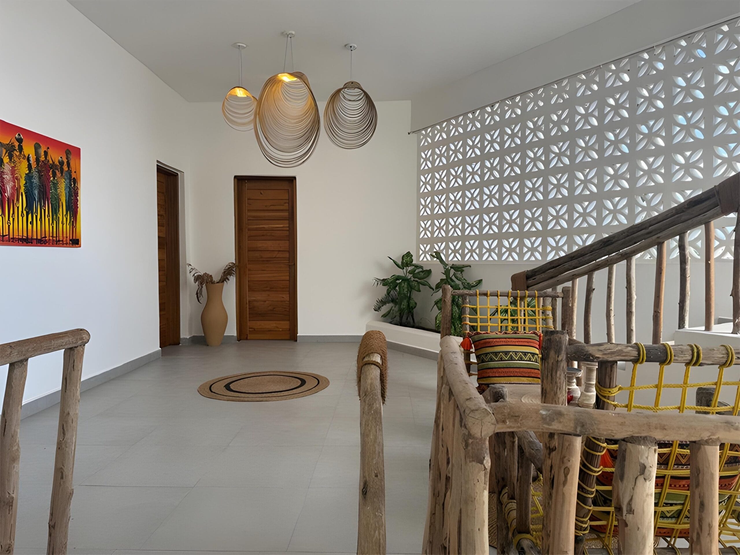 Indoor dining area with wooden furniture and local decor at ÔTALIA Hotel Reception