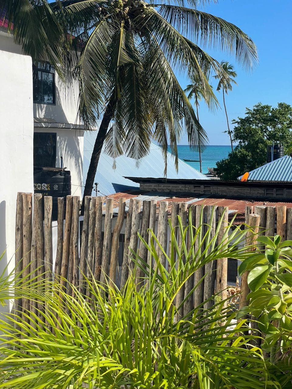 Ocean view terrace restaurant at ÔTALIA Hotel with outdoor dining tables