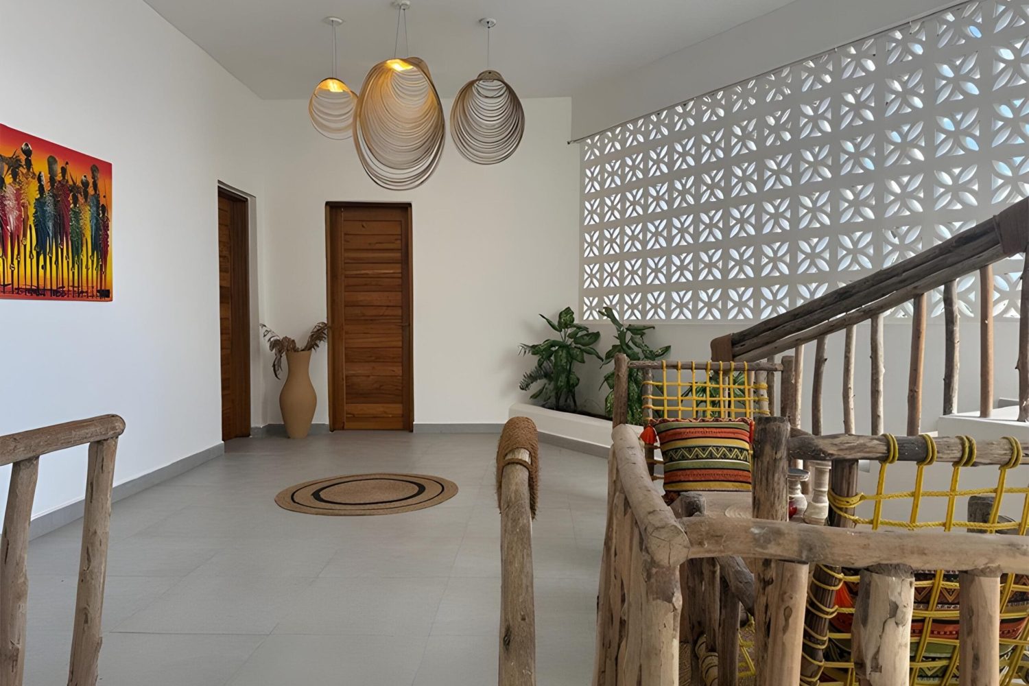 Indoor dining area with wooden furniture and local decor at ÔTALIA Hotel Reception